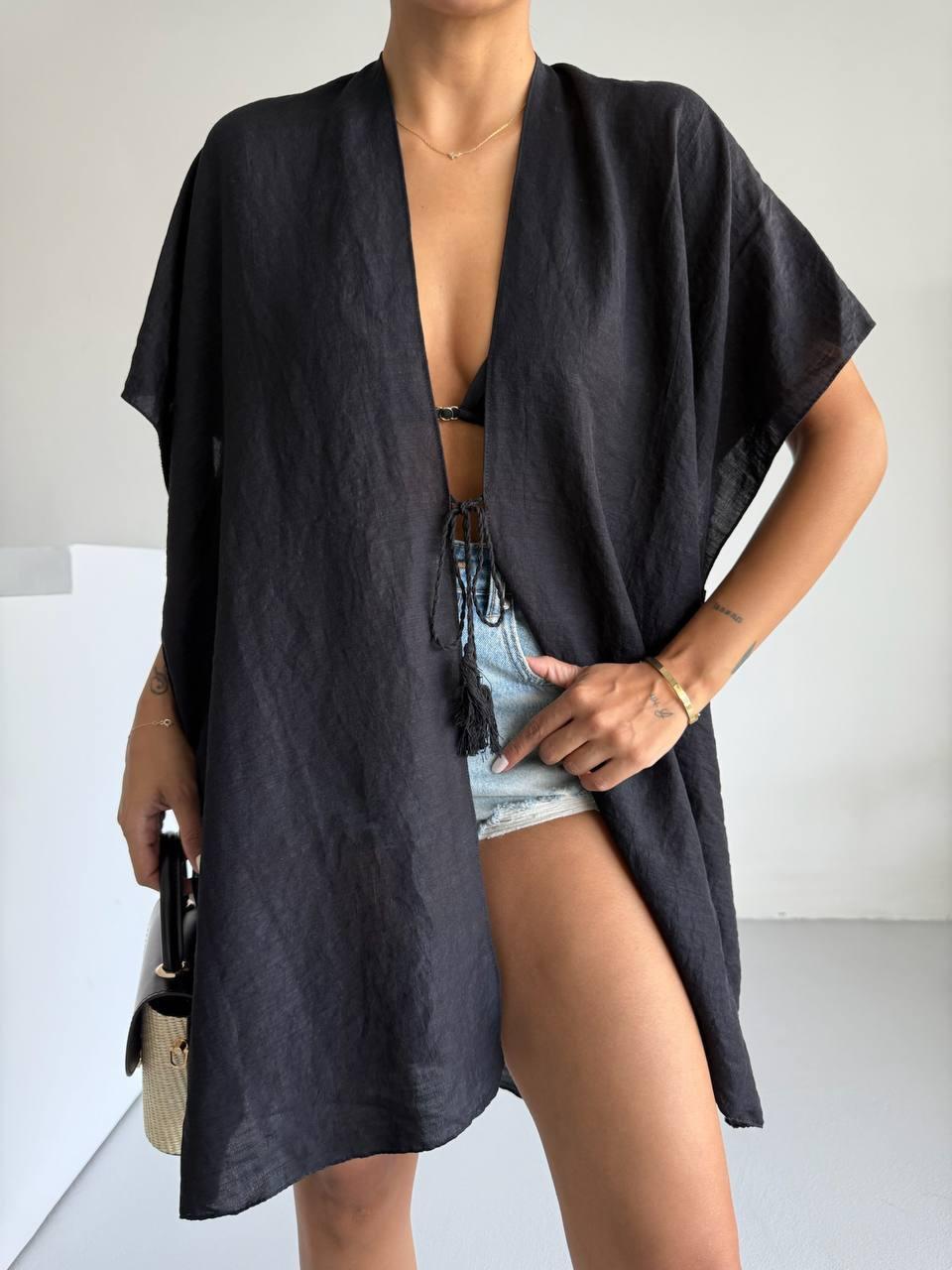 Beach kimono cape in lightweight fabric with deep V neckline and tassel ties
