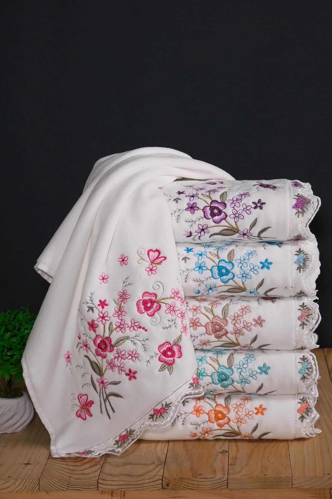 Lace towel with a floral pattern