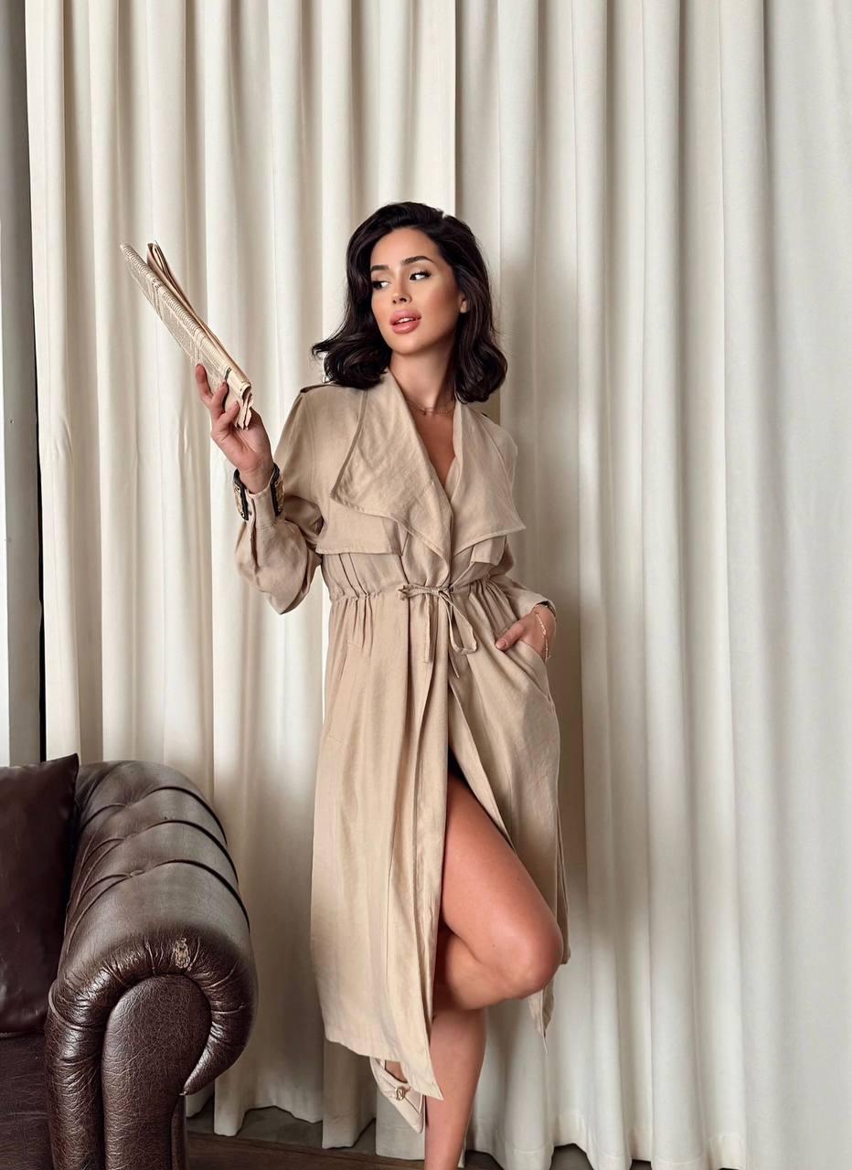 Beige, linen-like, long trench coat with a drawstring waist and draped collar