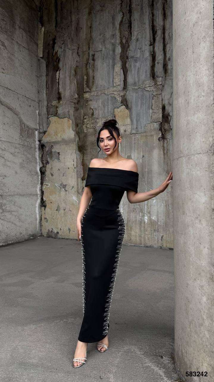 Evening dress with open shoulders and rhinestones