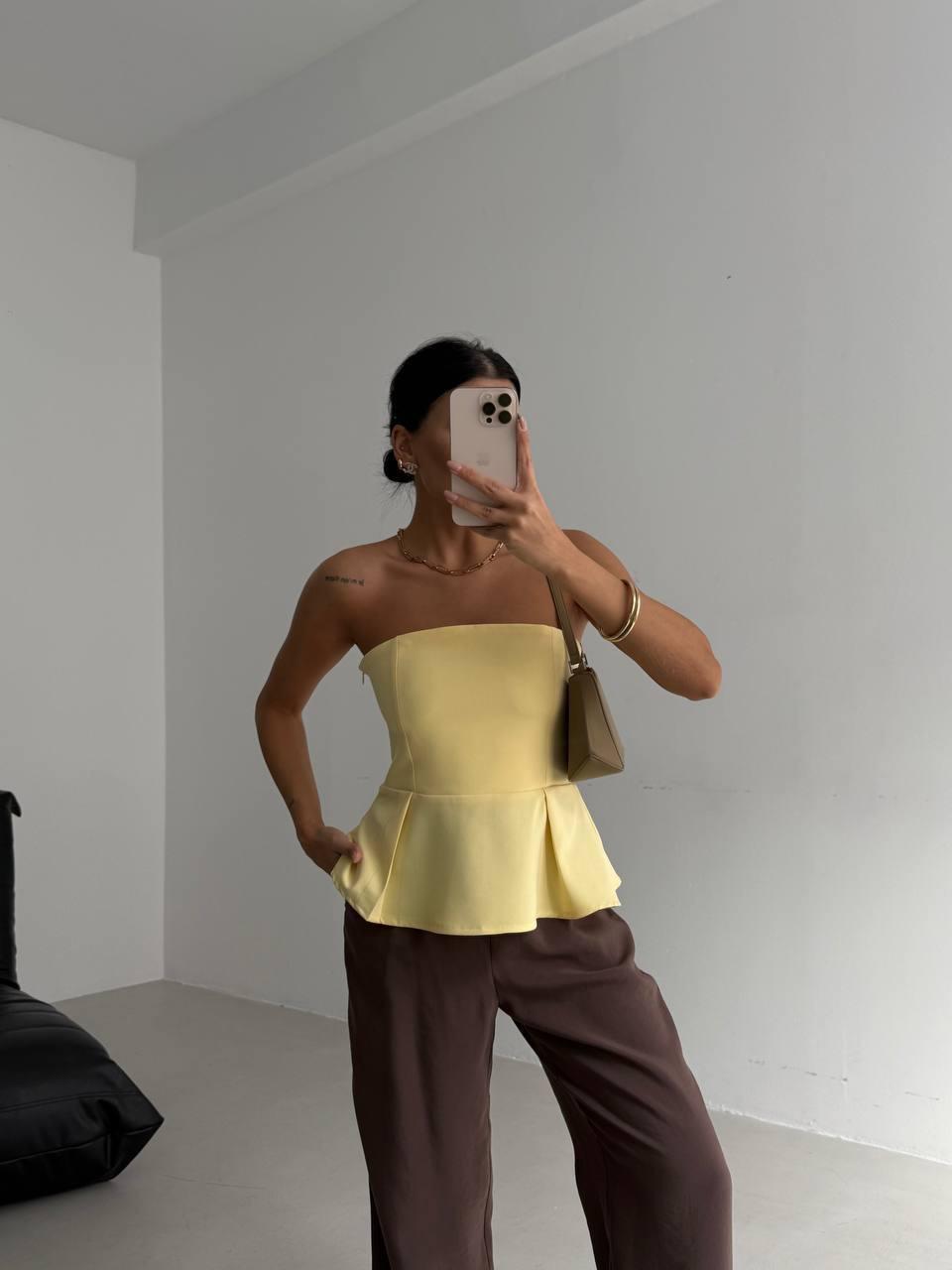 Strapless top with basque