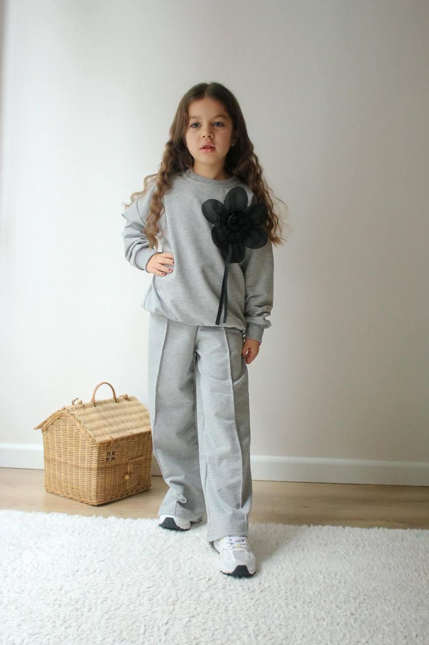 Стильді және ыңғайлы балаларға арналған топ пен шалбар жиынтығы